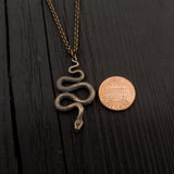 Snake pendant with coin on delicate chain | Moon Raven