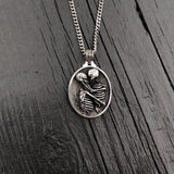 Silver necklace with detailed skeleton pendant | Moon Raven