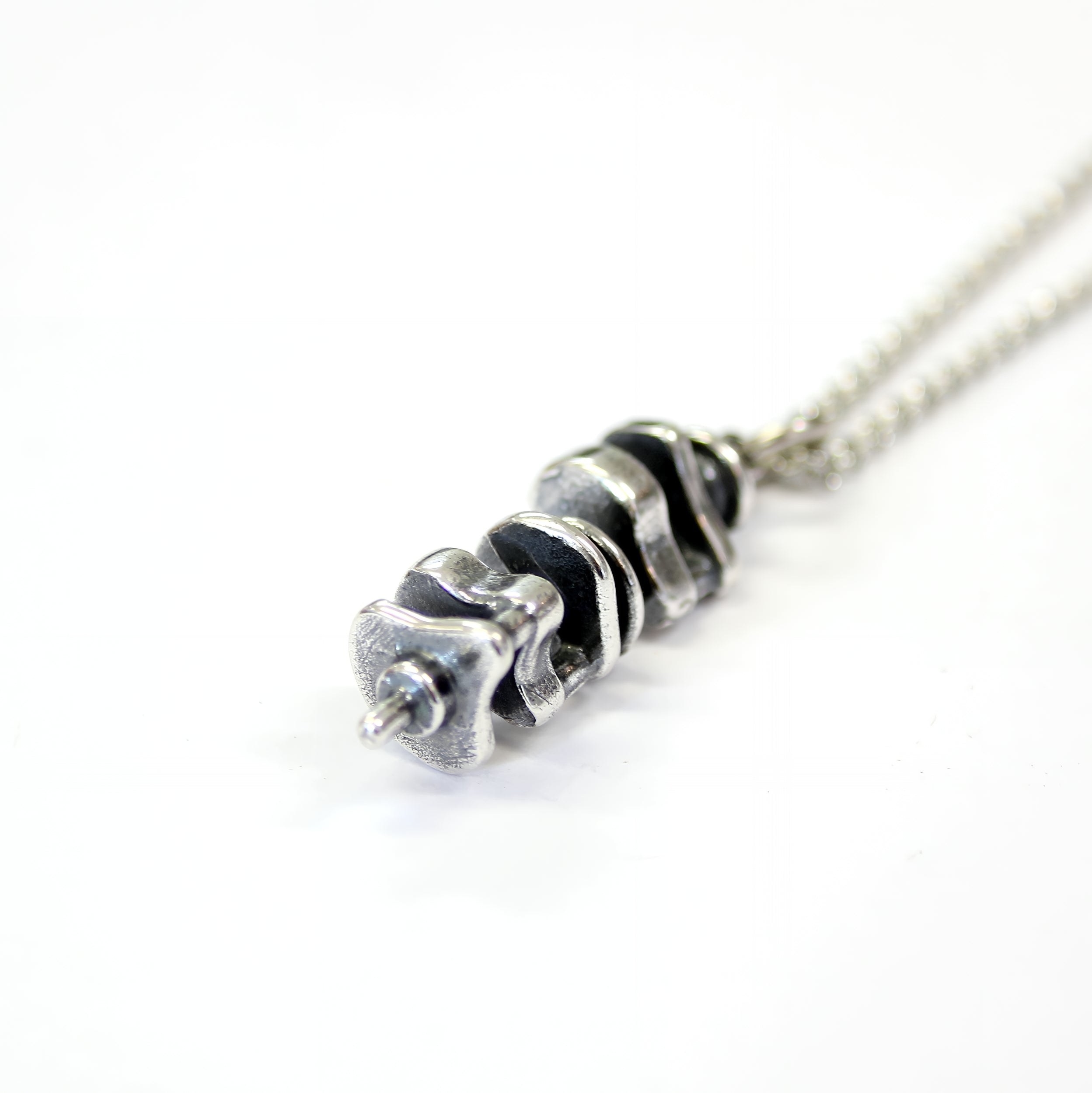 Silver necklace with delicate chain, metal pendant