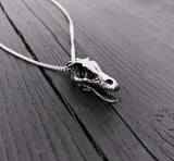 Silver necklace with intricate dragon head pendant | Moon Raven