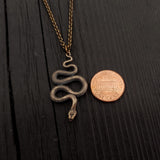 Snake pendant with coin on delicate chain | Moon Raven