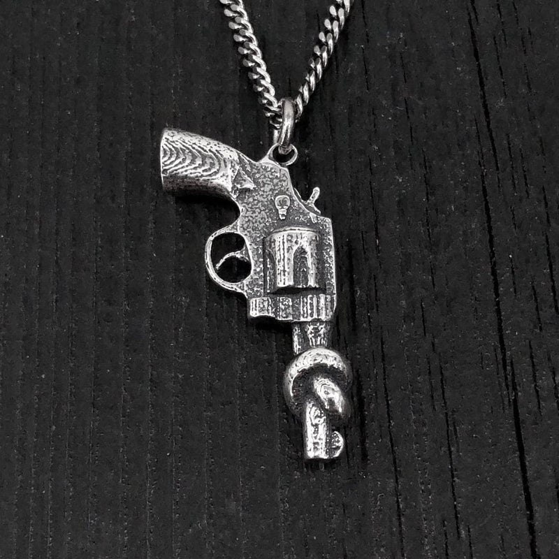 Sterling Silver Knotted Gun Pendant: Symbol of Peace and Non-Violence, Symbolic Jewelry,