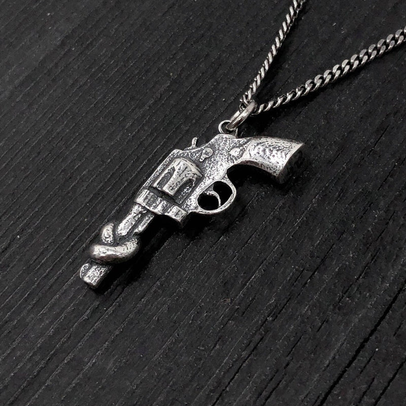 Sterling Silver Knotted Gun Pendant: Symbol of Peace and Non-Violence, Symbolic Jewelry,