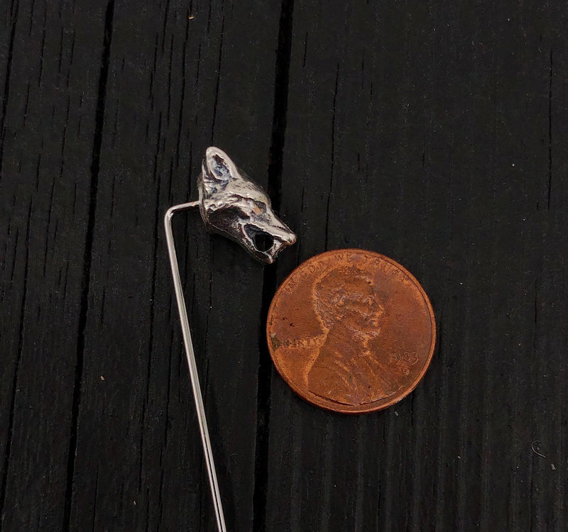 Close-up of penny next to silver fox head pin details | Moon Raven