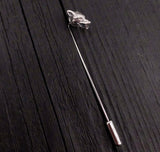 Sterling silver wolf head stickpin on black textured surface | Moon Raven