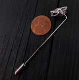 Penny beside silver fox head pin, contrasting coin and jewelry | Moon Raven