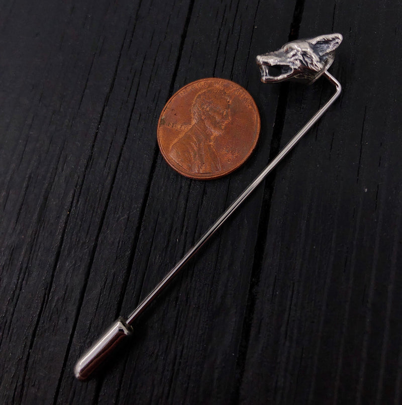 Penny beside silver fox head pin, contrasting coin and jewelry | Moon Raven