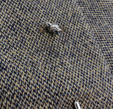 Silver wolf head pin on tweed jacket, elegant touch | Moon Raven